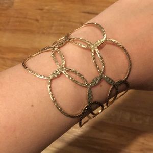 Interlocking oval gold tone bracelet
